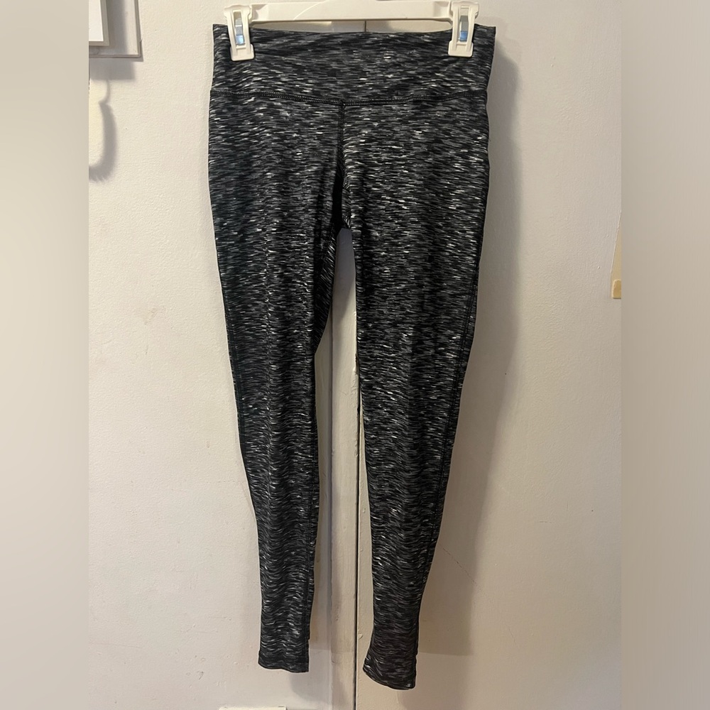 Pilates/yoga pants with built in footie that covers foot (exposed toe) for class